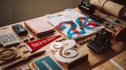 desk adorned with items related to or illustrating typography and type-setting