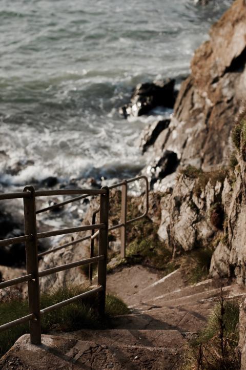 rocky steps down to beach